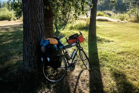 Riding bikes on the Trail of the Coeur d'Alenes at CDA River RV, Riverfront Campground